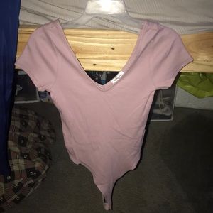 Never worn stitch and pine body suite